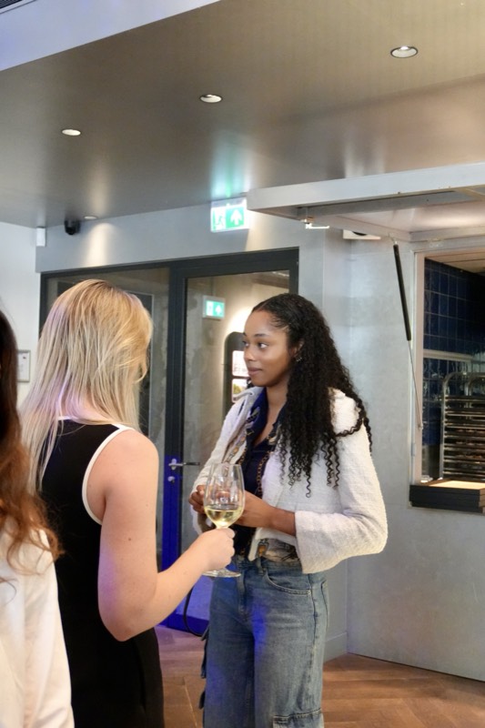 Two guests in conversation
