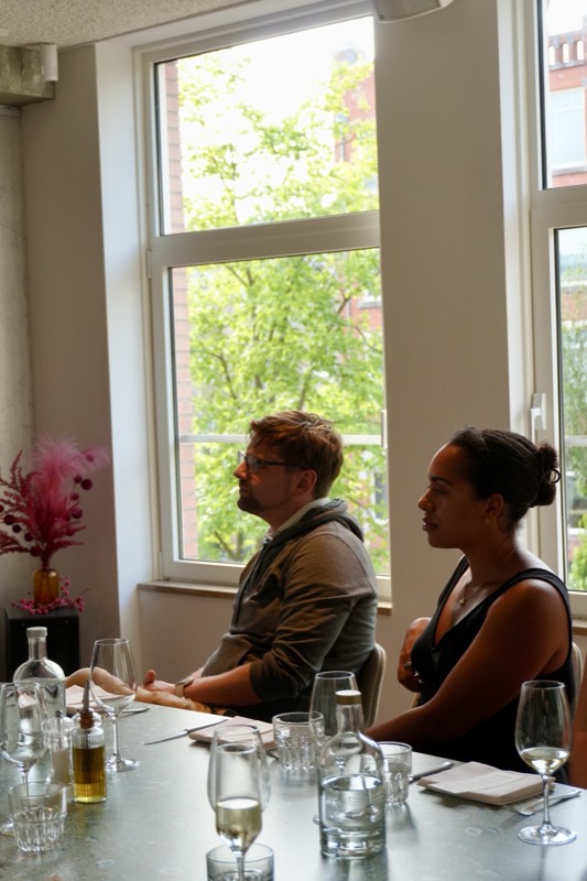 Guests listening to the masterclass